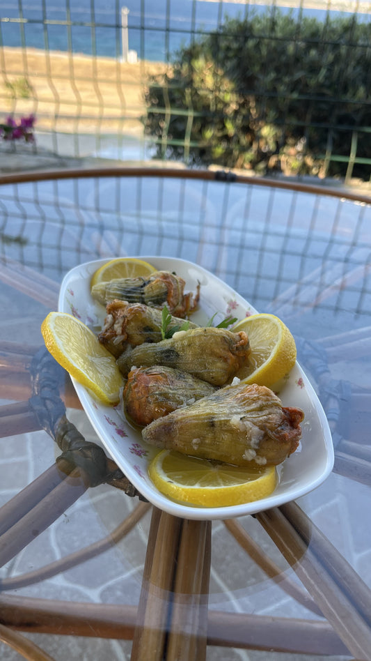 This image tells us about stuffed zucchini flowers, kabak cicegi dolmasi,zagodaoliveoil.com